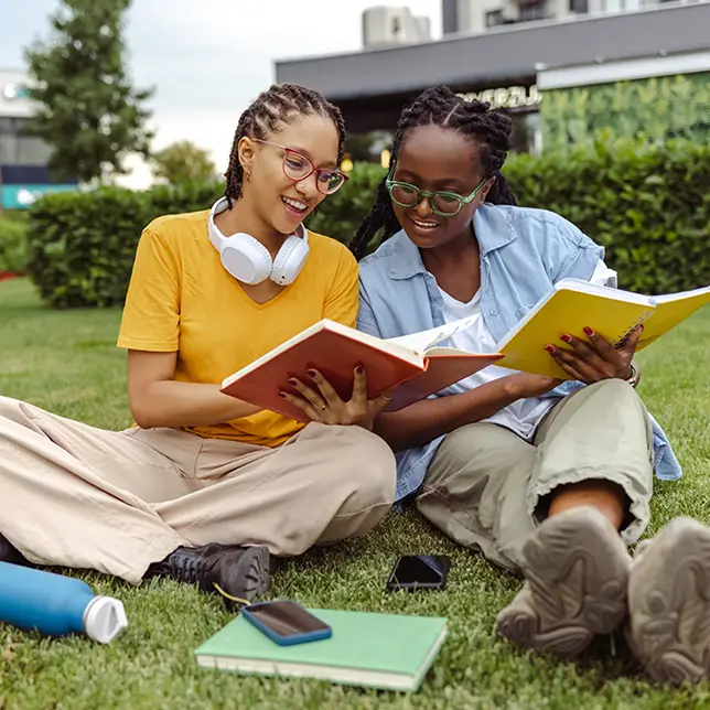 two young women studying